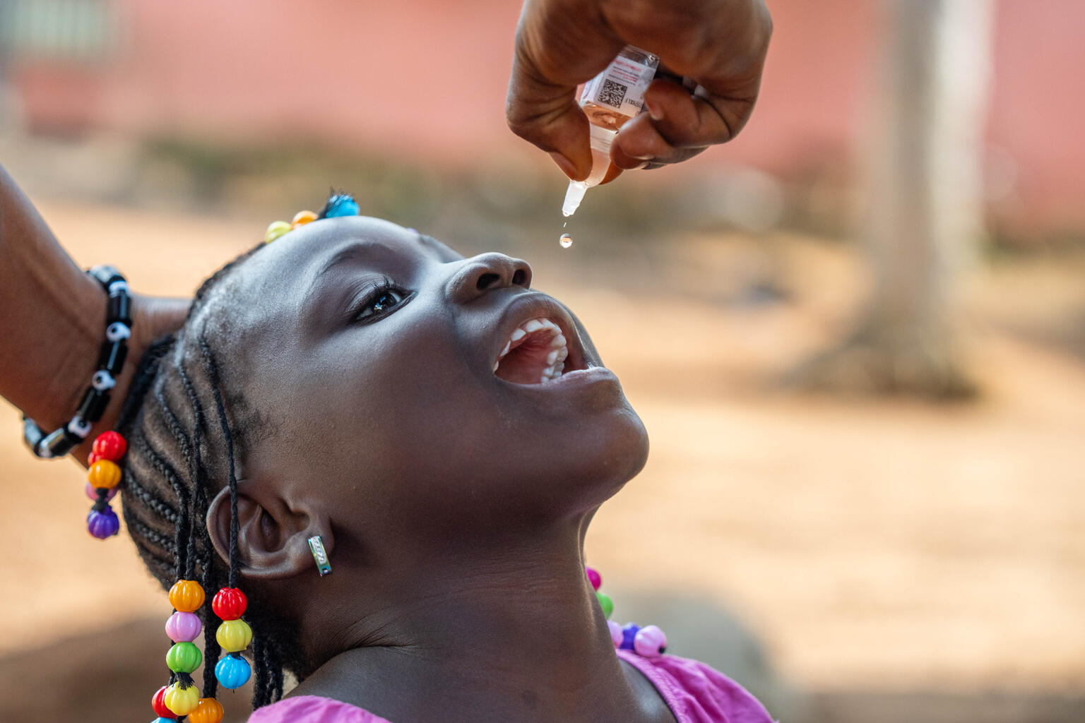 On 29 October 2023, Matina, 4, receives her vaccine against polio in Nzerekore, Guinea.