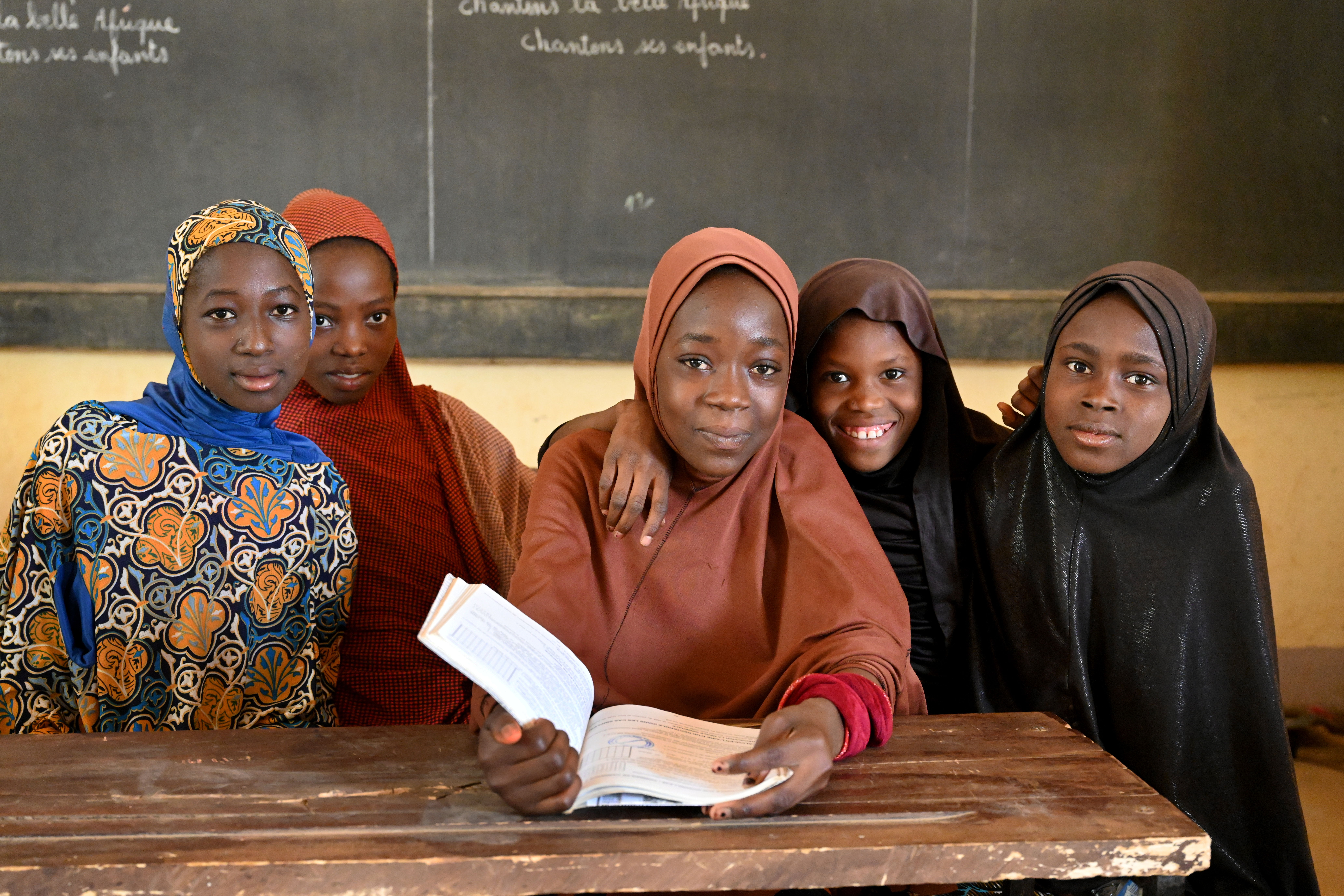 Group of girls with a book