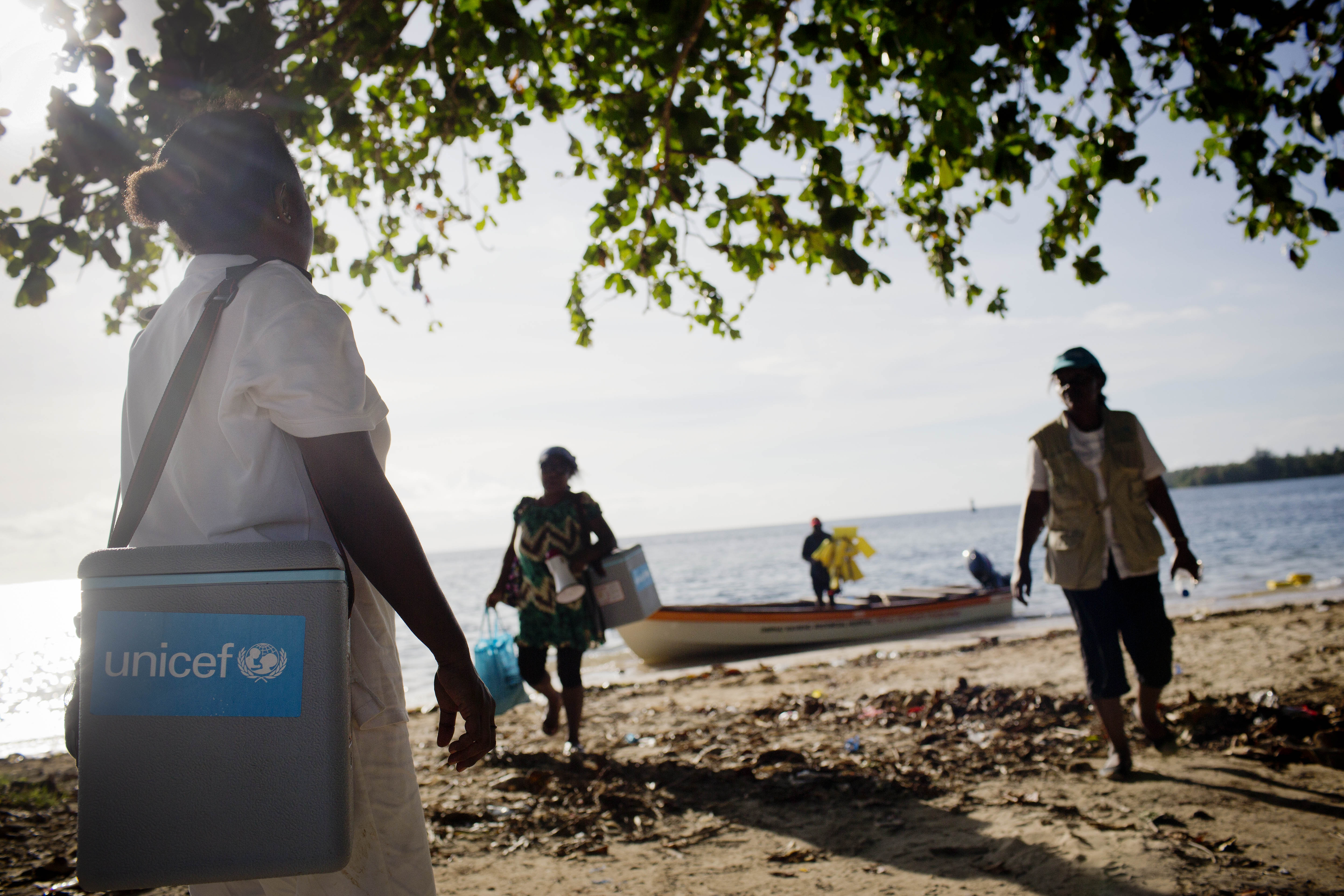 Unicef representatives arriving by boat