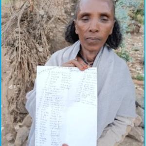 Hinto Hailu, a women development group leader, proudly displays a handwritten list of children under 10 from her village. She plays a key role in organizing and tracking vaccination efforts to ensure that every child in her community is protected from preventable diseases.