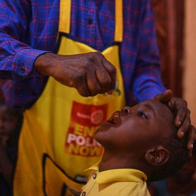 Children taking the polio vaccine drops.