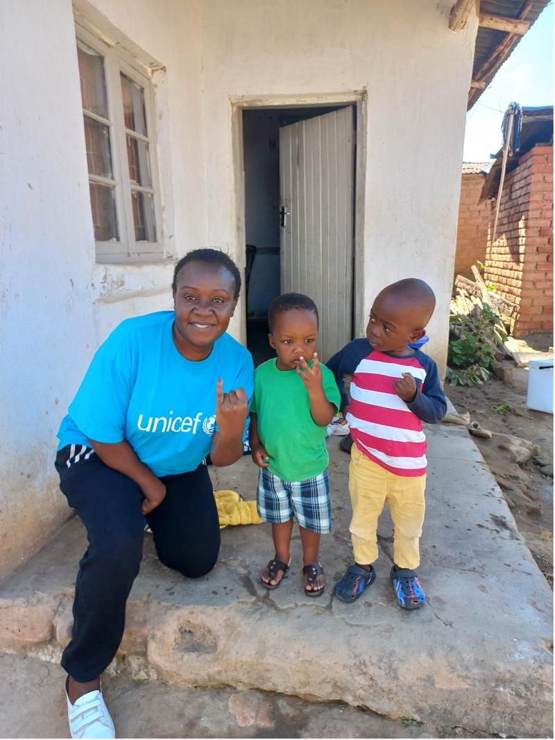 Mwenecho Mbambo, 3, and Wanangwa Mbale, 3, in Mzuzu, showing their marked fingers
