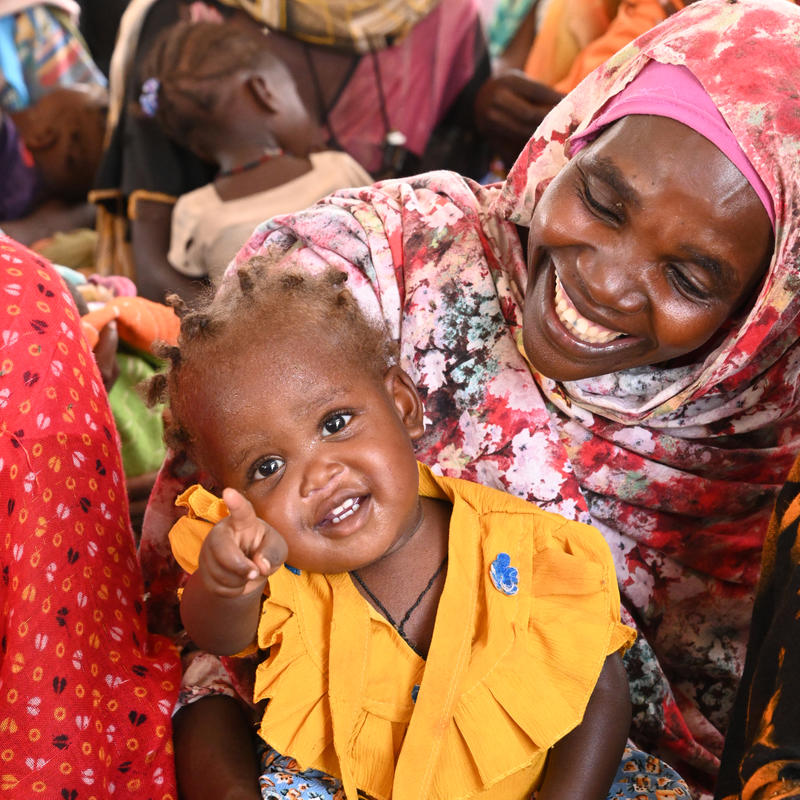 Child pointing at the camera