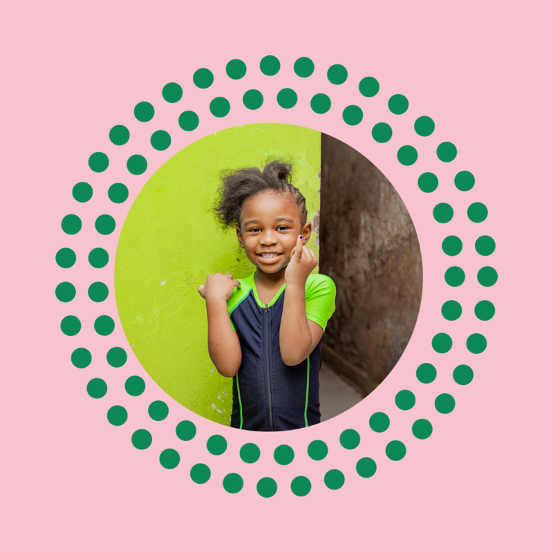 Child showing the marked finger after polio vaccination
