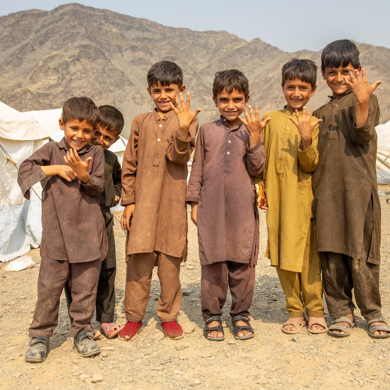 A group of children showing their marked finger