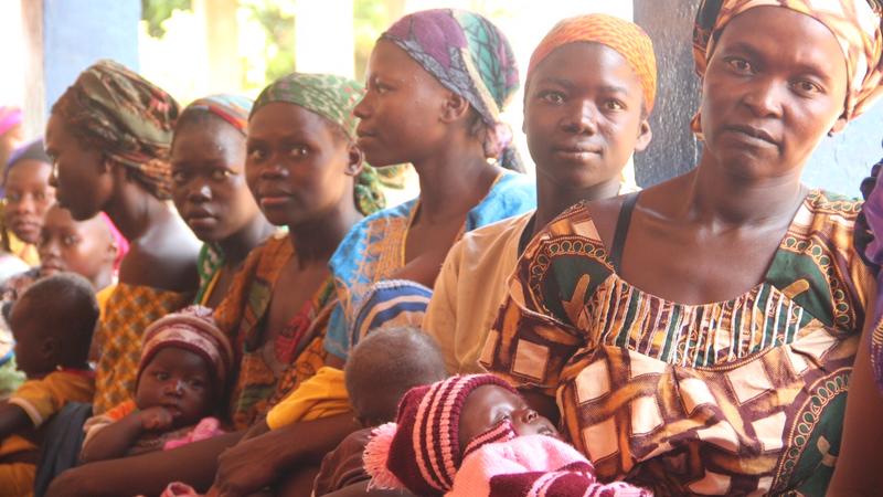 A group of woman holding their babies