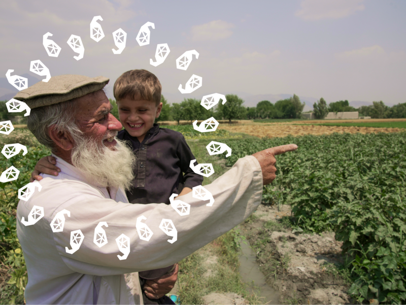 Grandparent holding his grandchild