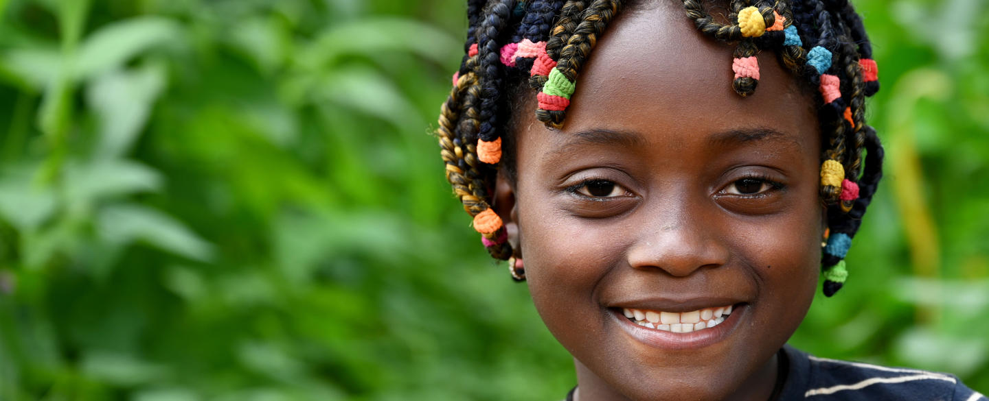Little girl smilling at the camera