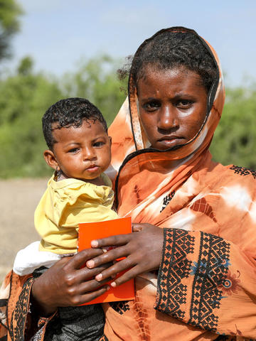 Woman holding child 